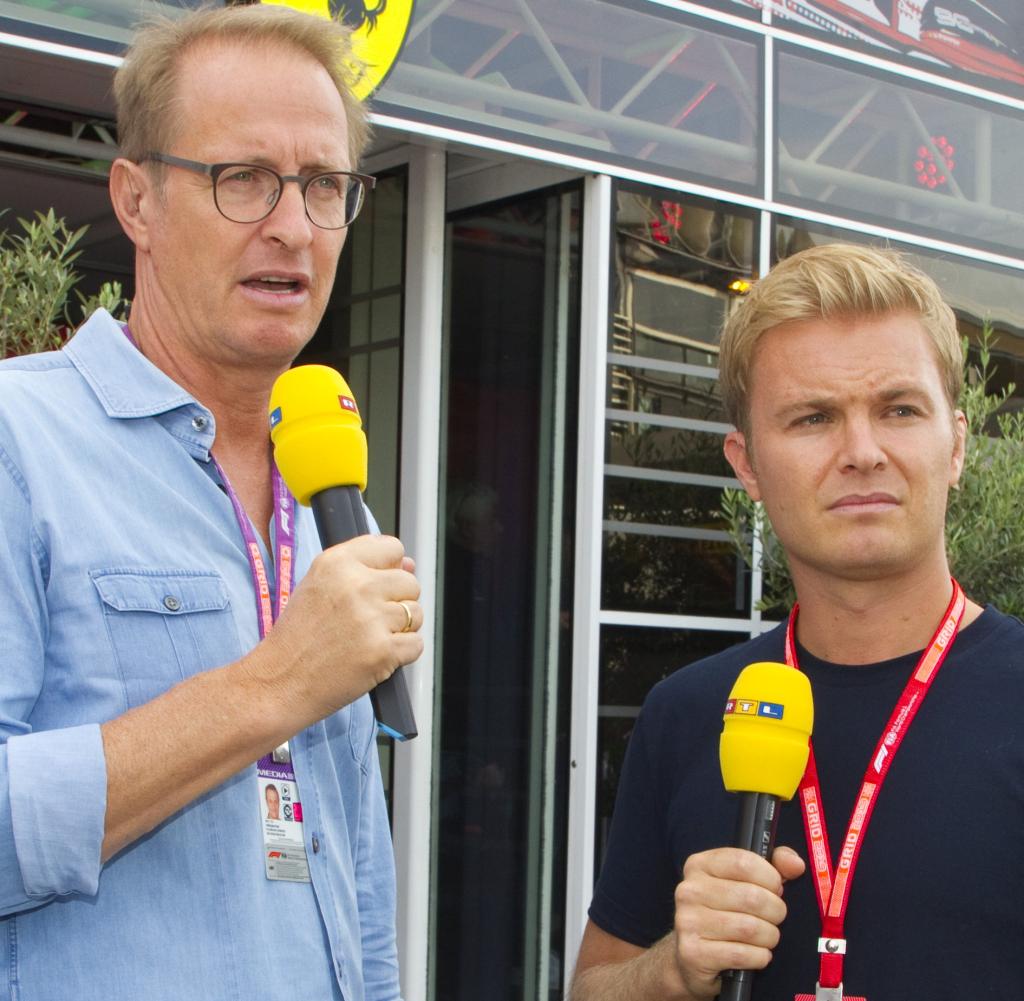 Florian König (links) mit dem ehemaligen Formel-1-Weltmeister Nico Rosberg bei einem Grand Prix der Rennserie.  Er ist seit 1994 bei RTL