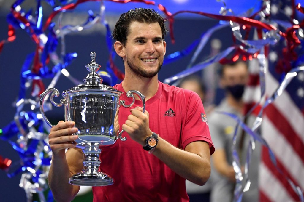 Dominic Thiem of Austria celebrates with the championship trophy after his match against Alexander Zverev of Germany (not pictured) in the men
