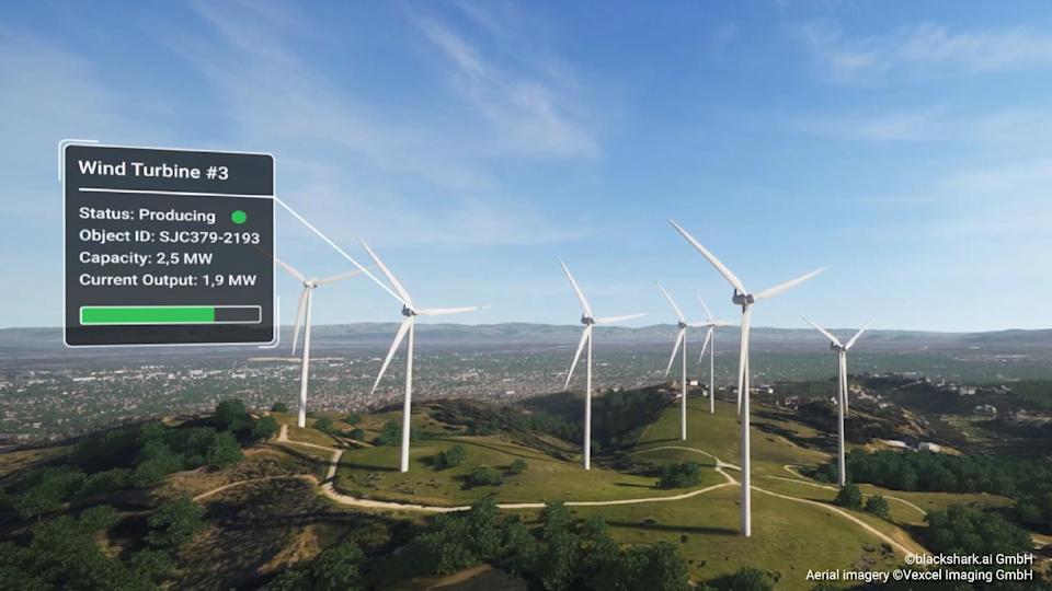 Eine digitale Rekonstruktion eines Hügels mit simulierten Windkraftanlagen und Daten zu ihrem Betrieb.