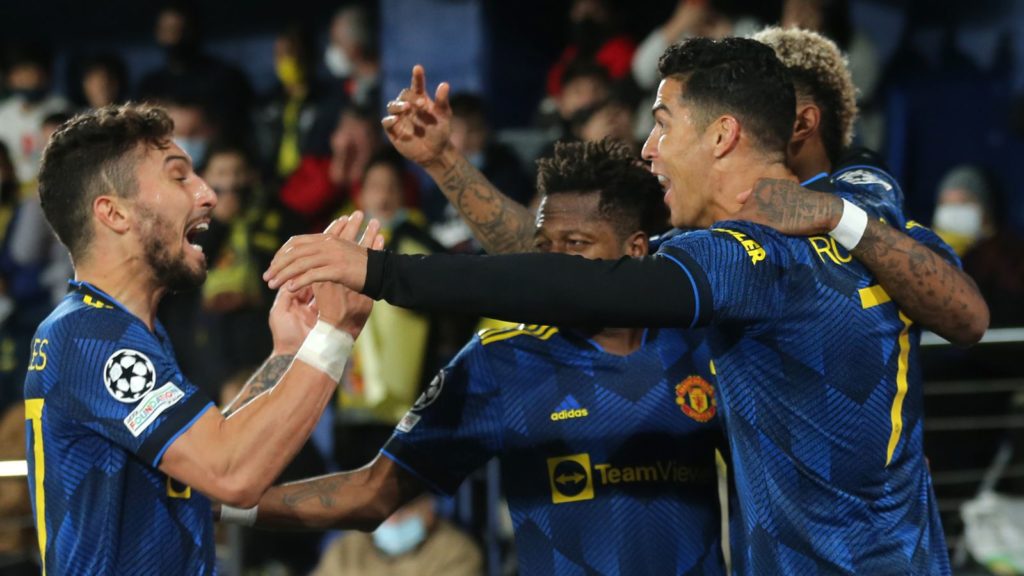Manchester United's Cristiano Ronaldo celebrates with team-mates after scoring against Villarreal